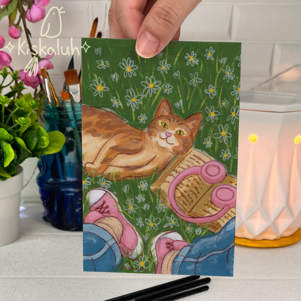 Orange cat among flowers and books Print , 4x6 in. / 8x10 in