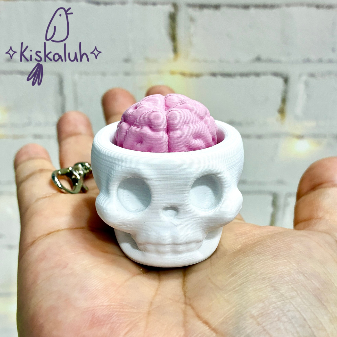 Craneo clicker, llavero fidget