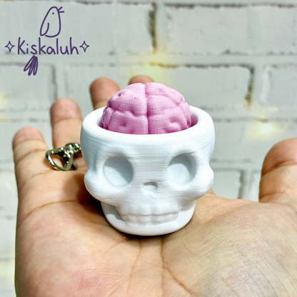 Craneo clicker, llavero fidget